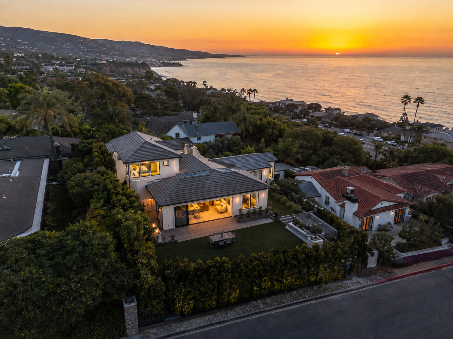 Southern California coastal neighborhood captured from the air at sunset