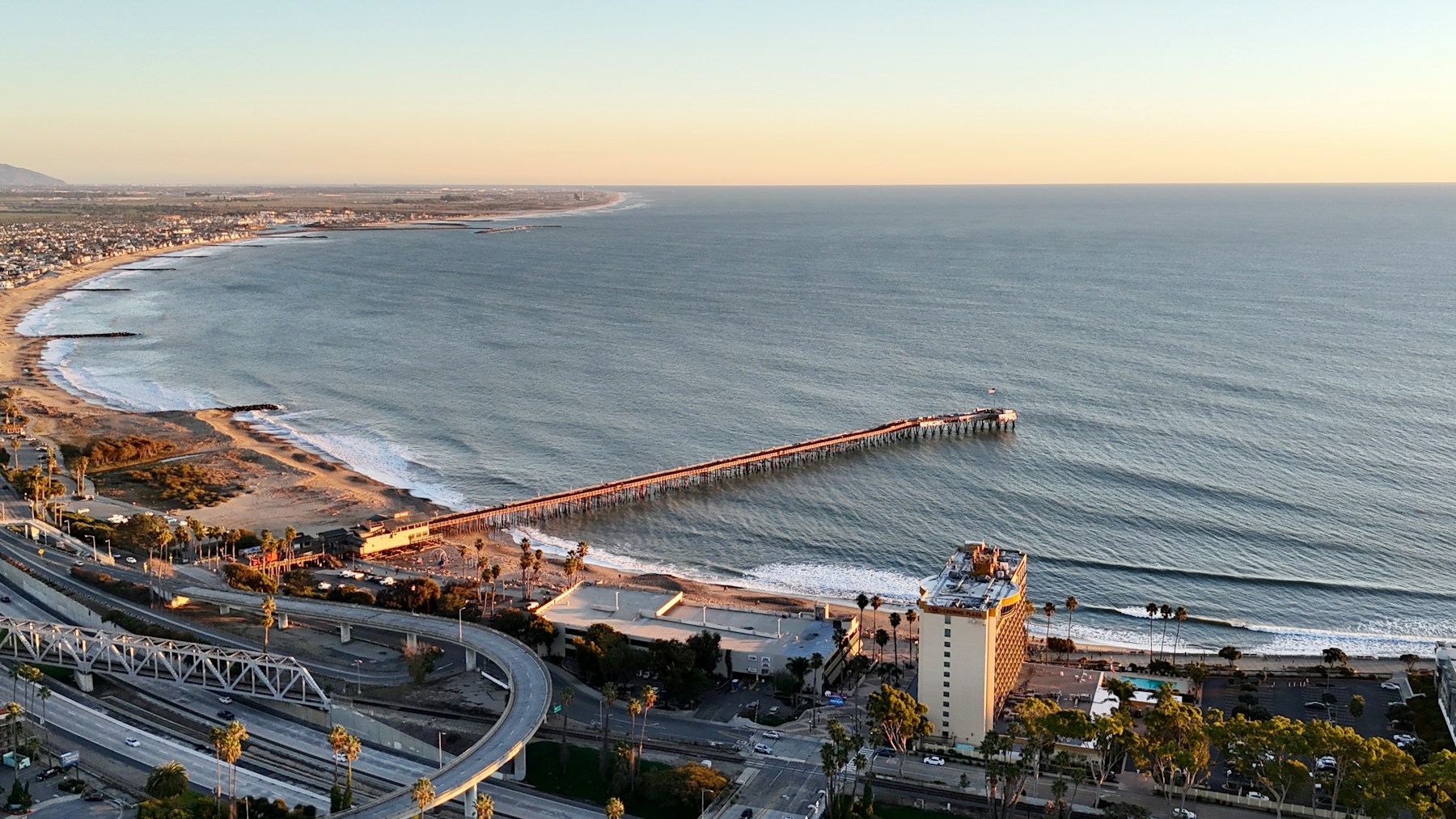 Aerial view of Ventura Beach Pier extending from the California shoreline into the Pacific Ocean