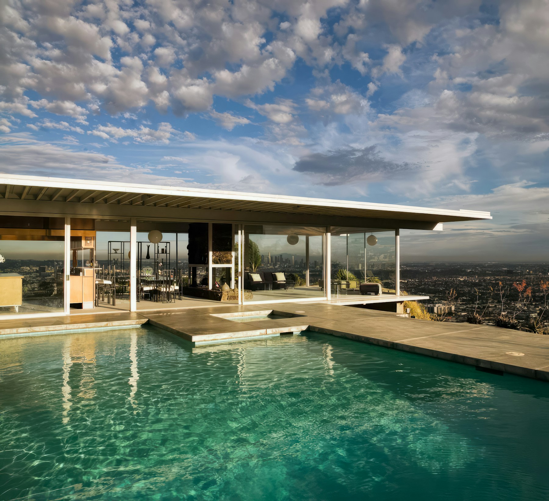Glass-walled Los Angeles midcentury residence with pool and expansive city views